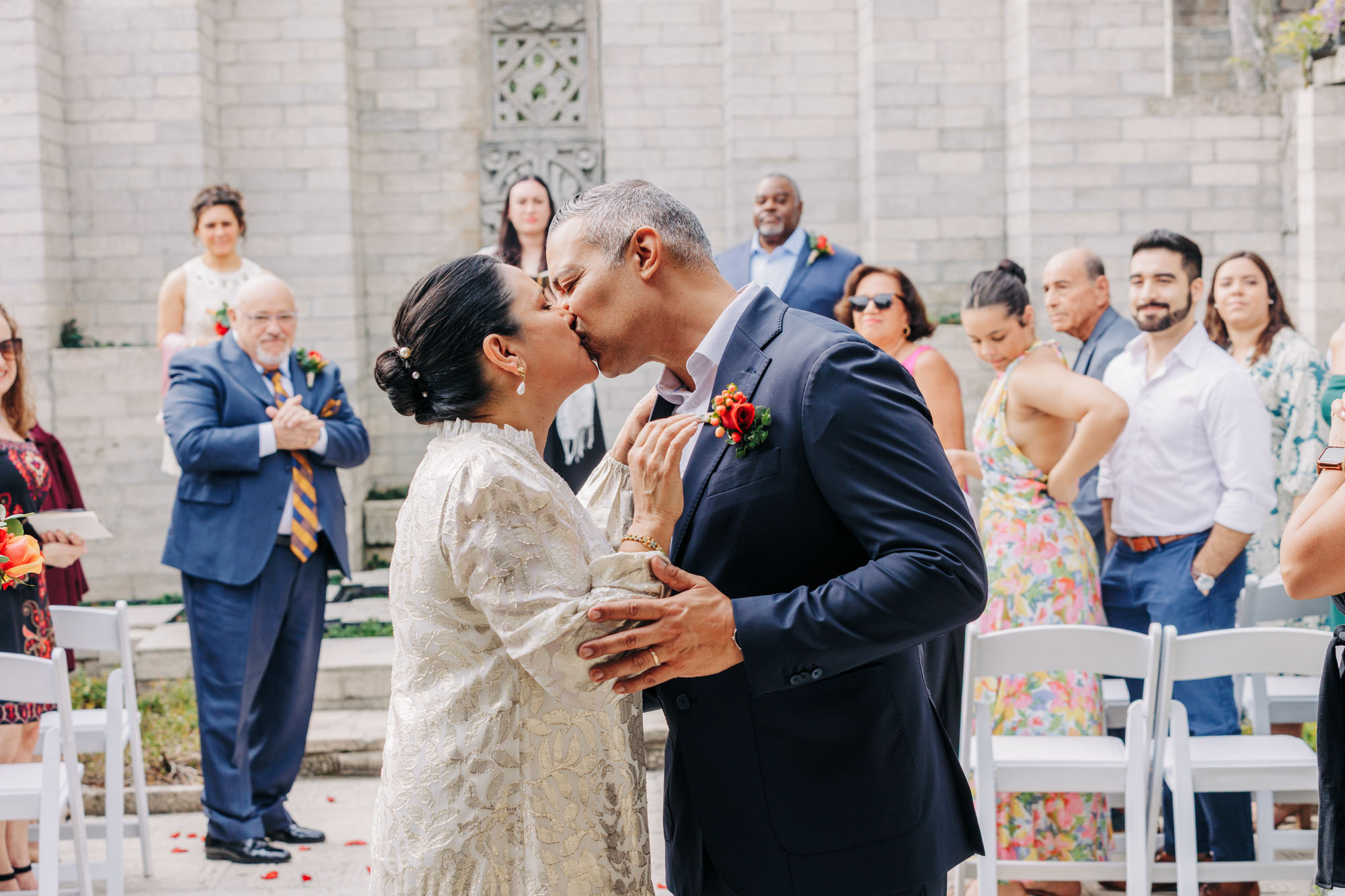bride and groom kiss at end of ceremony